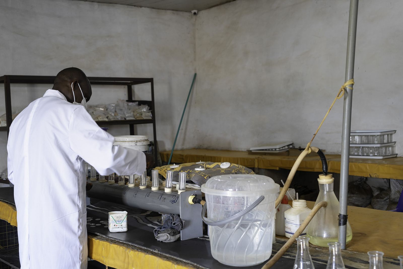 Laboratory technician testing mineral samples